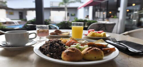 Picture of a breaskfast by the swimming pool